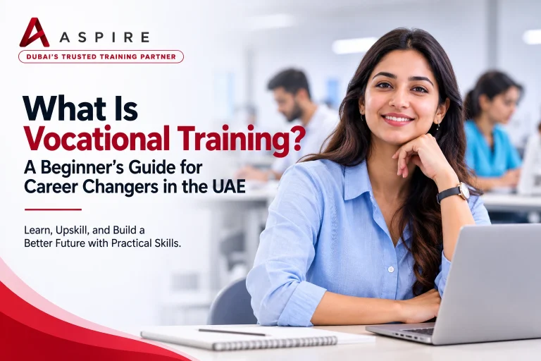 what-is-vocational-training-beginners-guide-uae Smiling woman in a professional training classroom using a laptop, with text reading “What Is Vocational Training? A Beginner’s Guide for Career Changers in the UAE.”